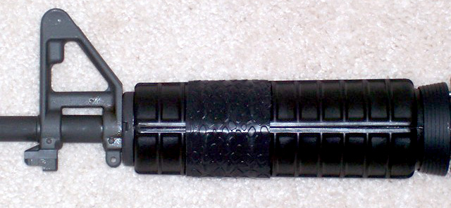 Close-up TUFF1 Boa Black on Colt Carbine handguard
