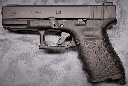 Glock 19 with trimmed TUFF1 Black Boa