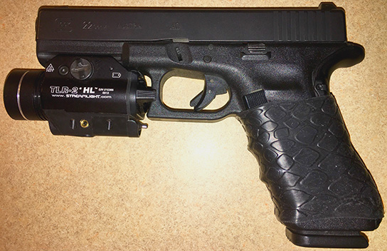 Glock 22 Gen4 40cal with TUFF1 Black Boa -- "I bought a TUFF1 grip for my Police duty weapon and I love the way it feels." sent in from BK.