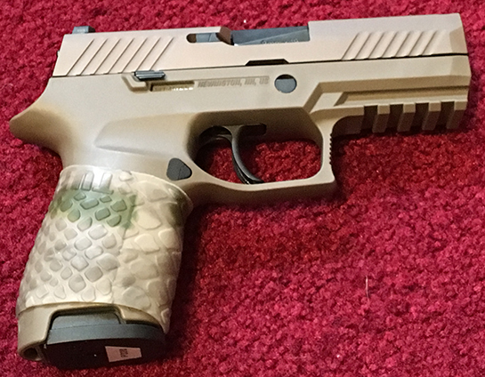 Sent in by J.W. Sig P320 9mm Compact with TUFF1 Boa AU Camo