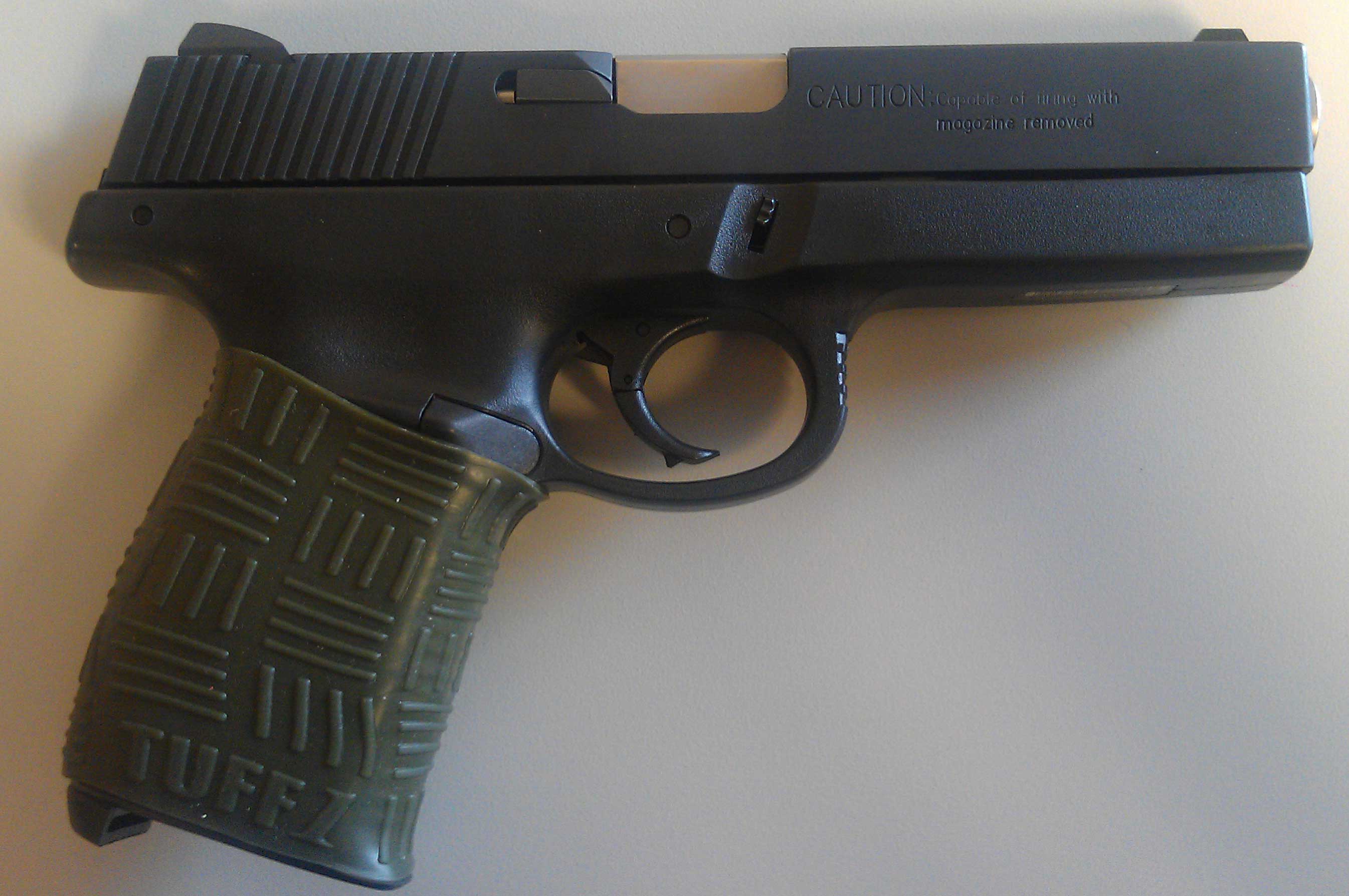 Smith & Wesson Sigma 9mm with TUFF1 ODGreen Double Cross Grip
