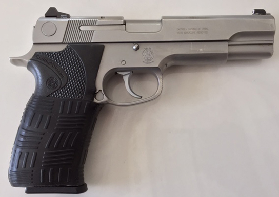S&W 1026 10mm. Virginia State Police issue 1990-1993. Double Cross sleeve fits great!