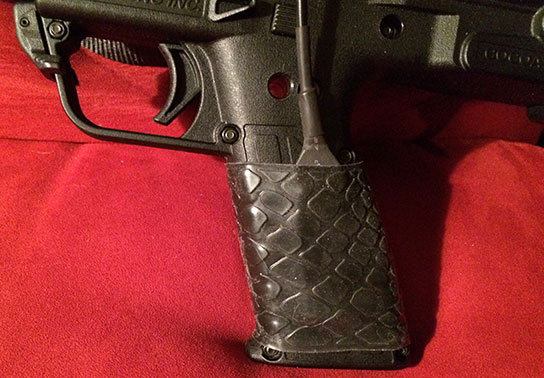 from S.H. ... TUFF1 Black Boa on Kel Tec Shotgun... "I purchased your grip in hopes that it would securely hold a pressure switch to a tactical flashlight, while still allowing the switch to function. It works great allowing gentle thumb pressure to activate the switch while the Boa holds it absolutely in place. The Boa also makes a secure grip giving confidence in handling the more than ample recoil of this gun. Thanks I will be ordering more soon.
