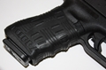 Picture of All Black 2 Pack TUFF1 Gun Grip - Double Cross Grip Black