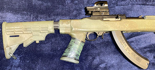 Sent in by N.T. Ruger 10/22 with TUFF1 Zombie Down! Grip