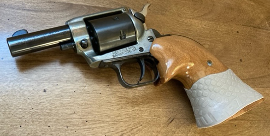 2nd pic - Sent in by R.L. - Heritage revolver with TUFF1 Boa Desert Tan cut to fit just how he wanted it.